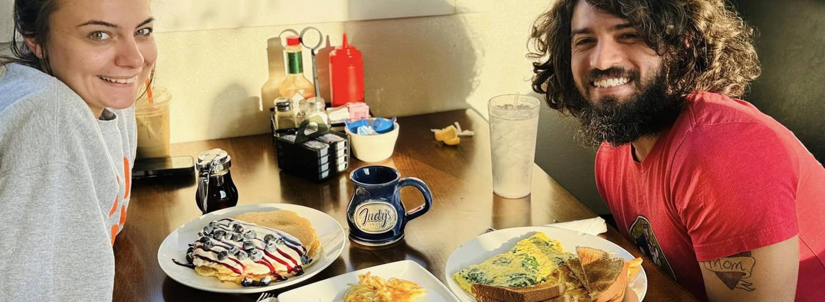 Woman and a man eating breakfast